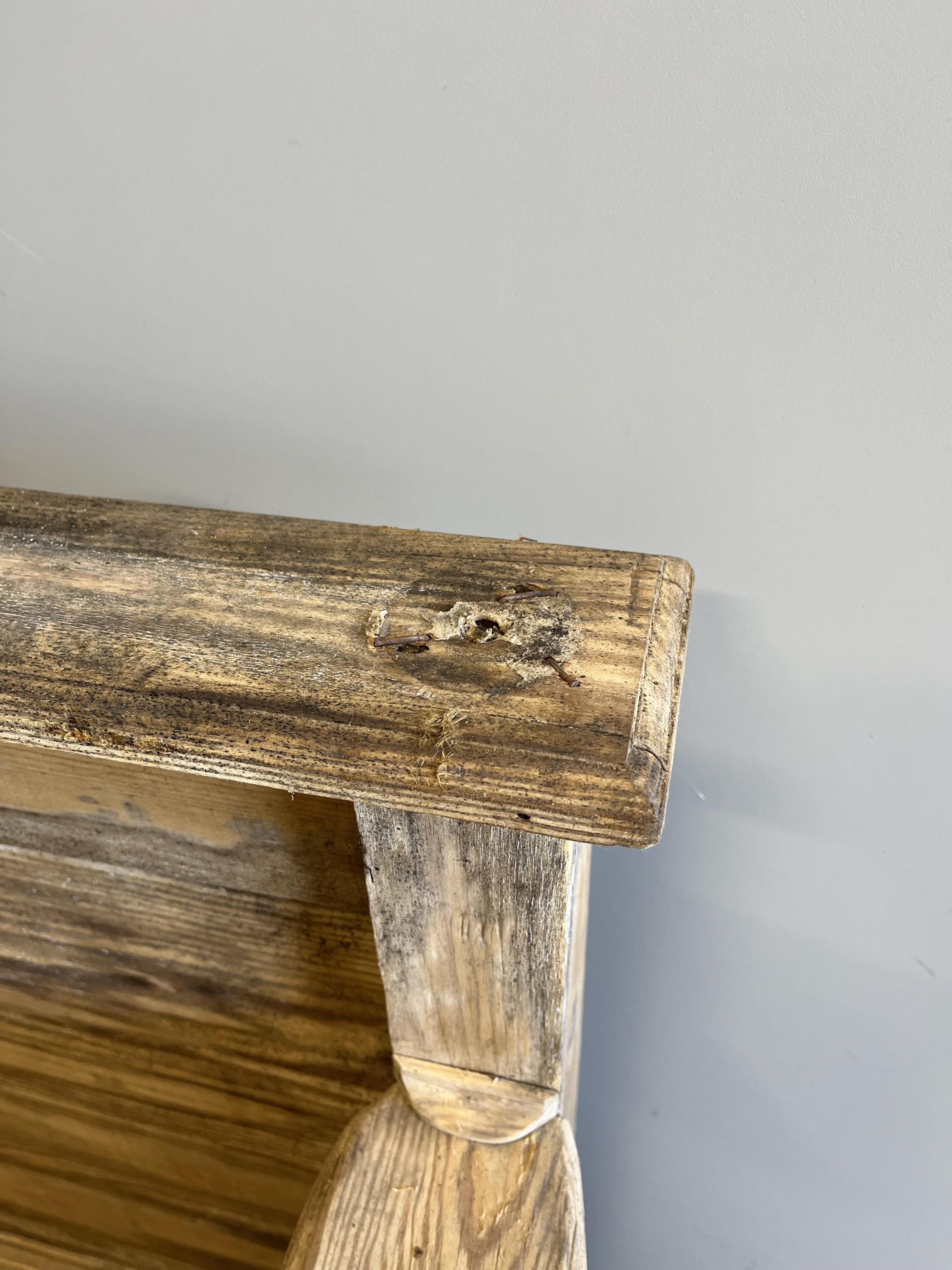 A Victorian style panelled pine settle, width 105cm, depth 60cm, height 110cm